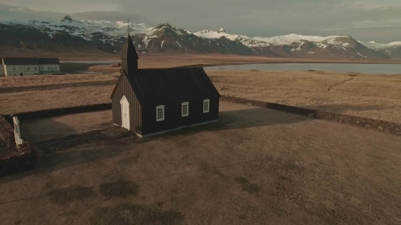 Free Video Stock Snow Covered Mountains Behind A Church Live Wallpaper