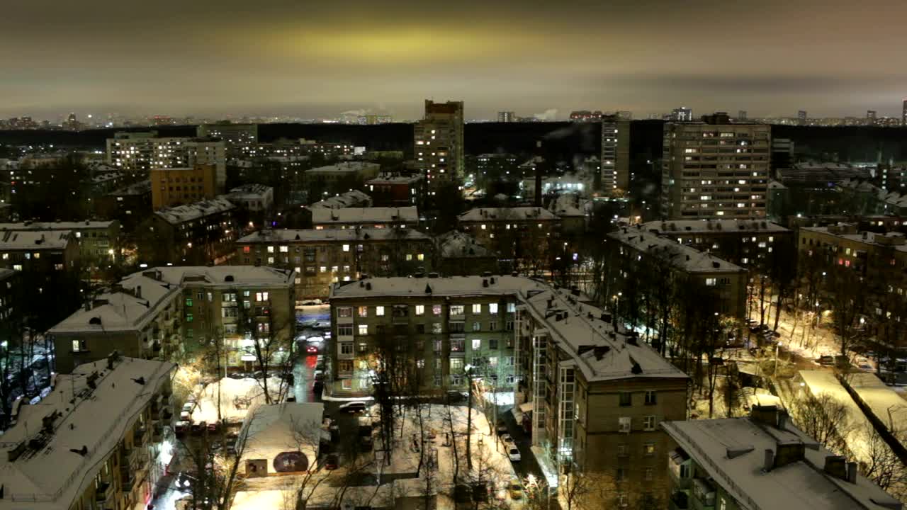 Free Video Stock Snow Covered Rooftops At Night Live Wallpaper