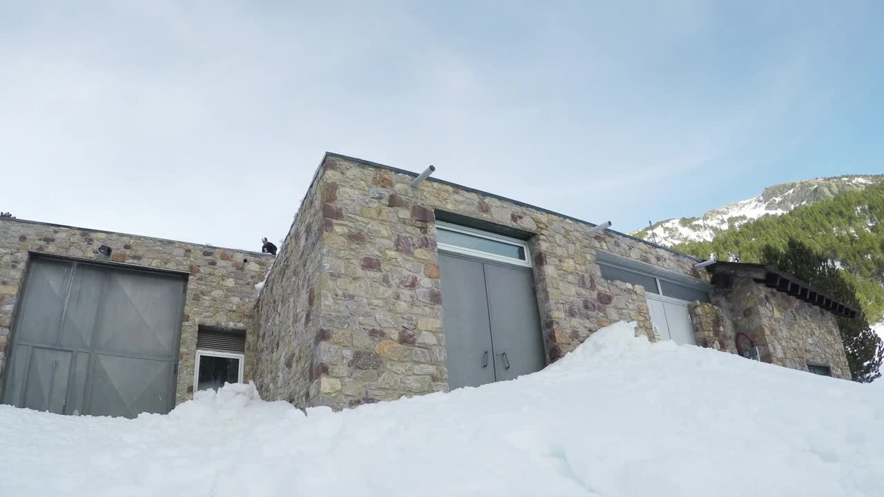 Free Video Stock Snowboarder Jumping From A Roof Live Wallpaper