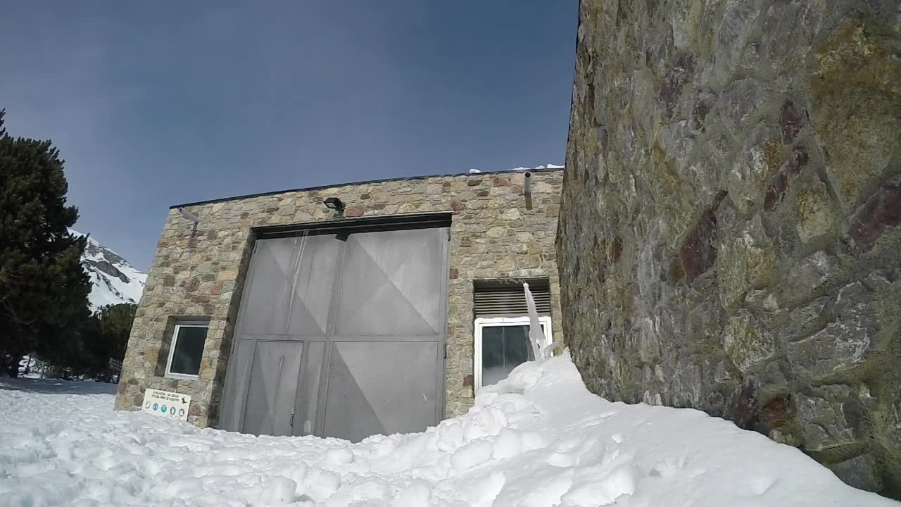 Free Video Stock Snowboarder Jumping From The Roof On The Snow Live Wallpaper