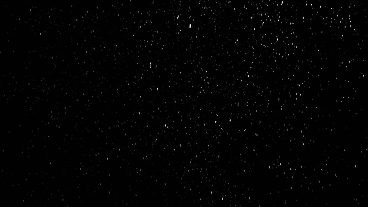 Free Video Stock Snowing On A Black Background Live Wallpaper