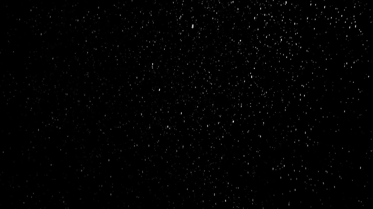Free Video Stock Snowing On A Dark Background Live Wallpaper