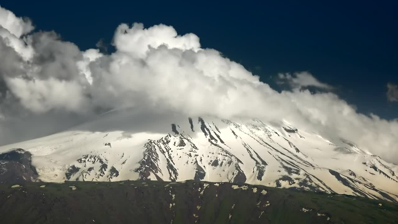 Free Video Stock Snowy Peak With Clouds Live Wallpaper