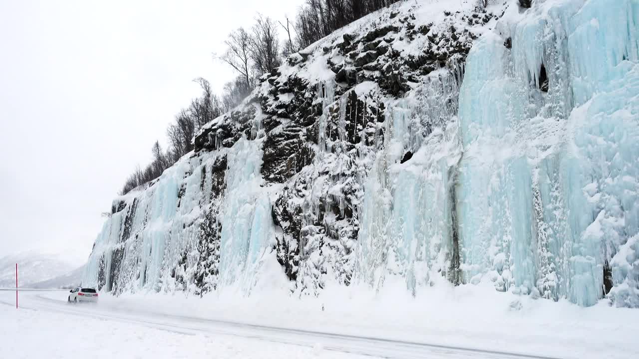 Free Video Stock Snowy Road And A Frozen Mountain Live Wallpaper