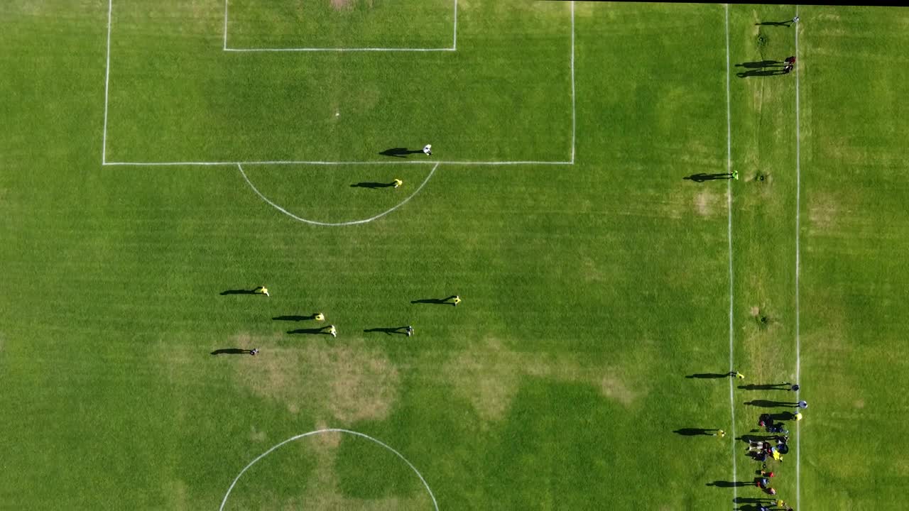 Free Video Stock Soccer Match On A Grass Court From Above Live Wallpaper