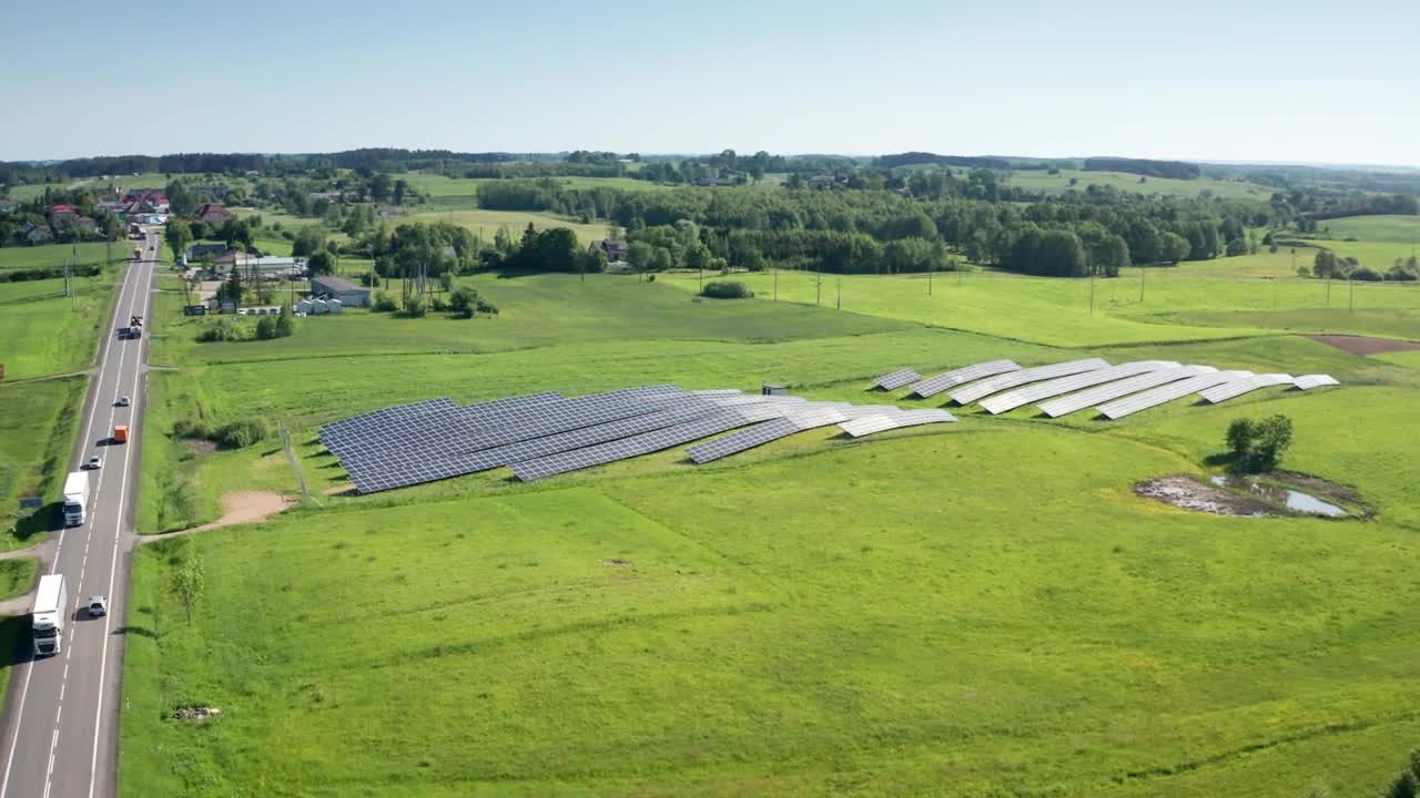 Free Video Stock Solar Panels Next To A Small Pond Live Wallpaper