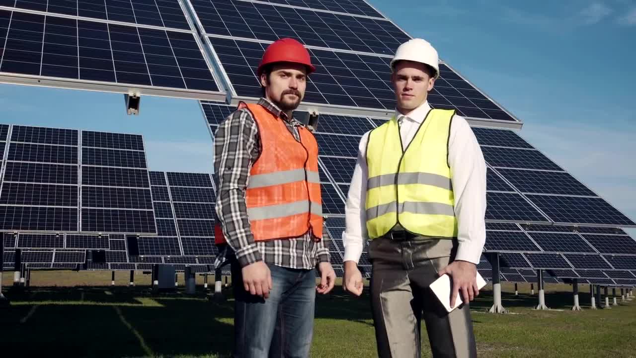 Free Video Stock Solar Power Engineers Posing To Camera Live Wallpaper