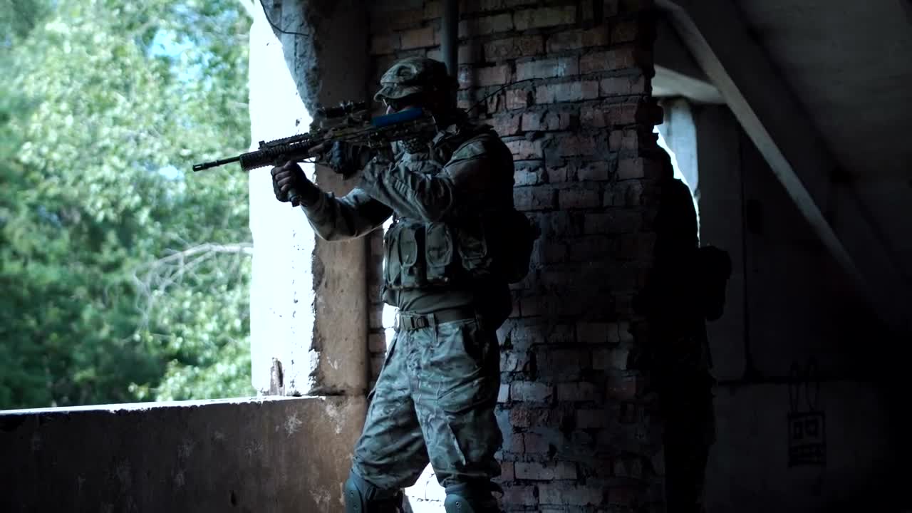 Free Video Stock Soldier Near A Window In An Abandoned Building Live Wallpaper