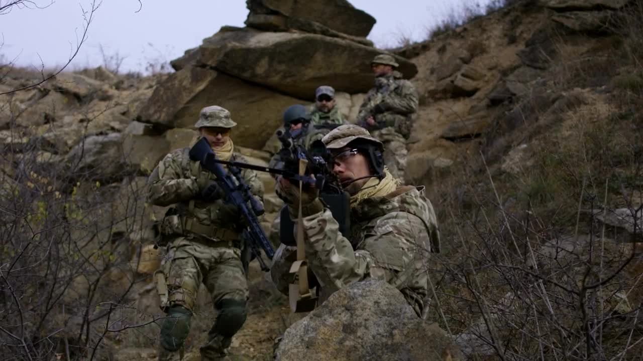 Free Video Stock Soldier Patrol Going Down The Hill Live Wallpaper