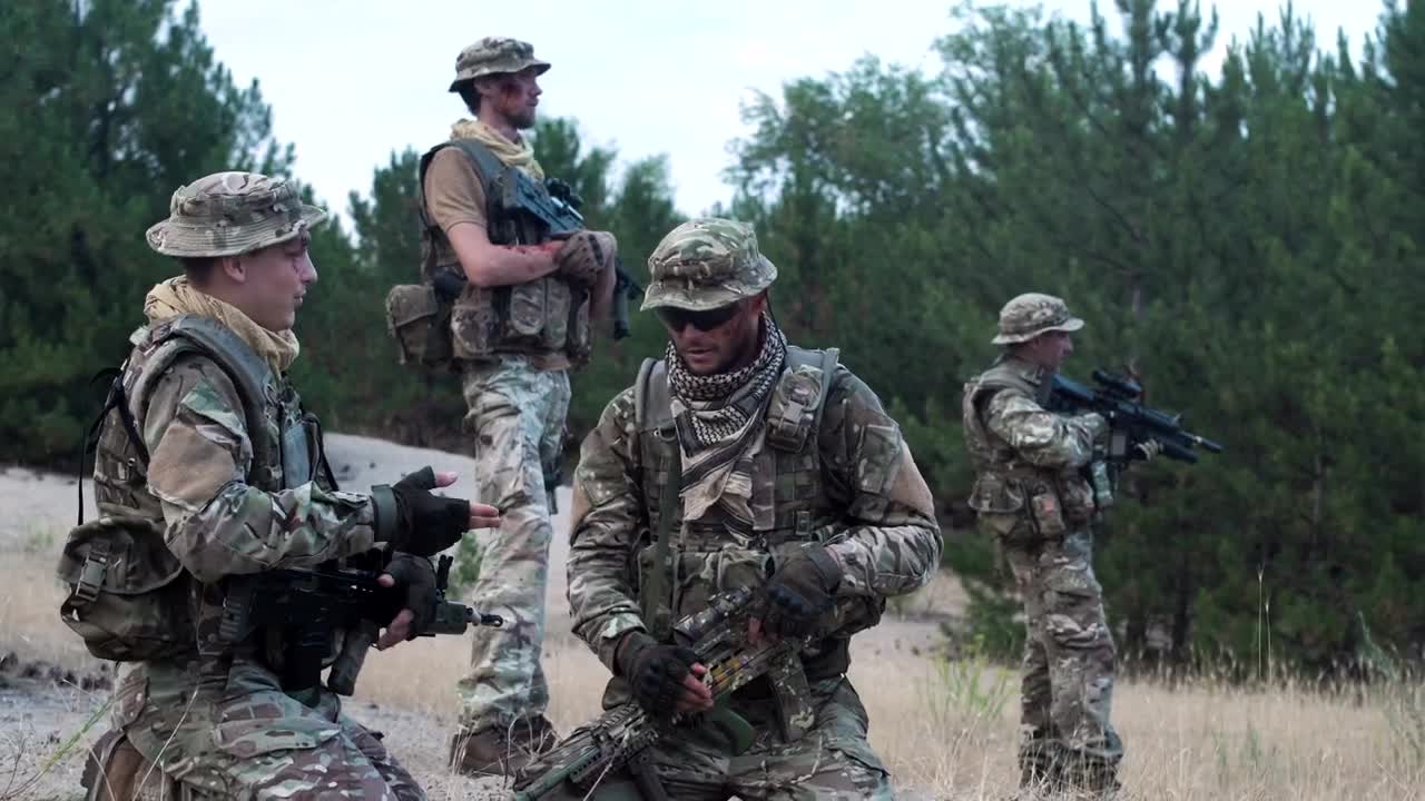 Free Video Stock Soldiers Checking The Strategy On The Map Live Wallpaper