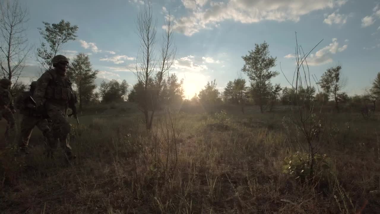 Free Video Stock Soldiers Walking Through The Field Live Wallpaper