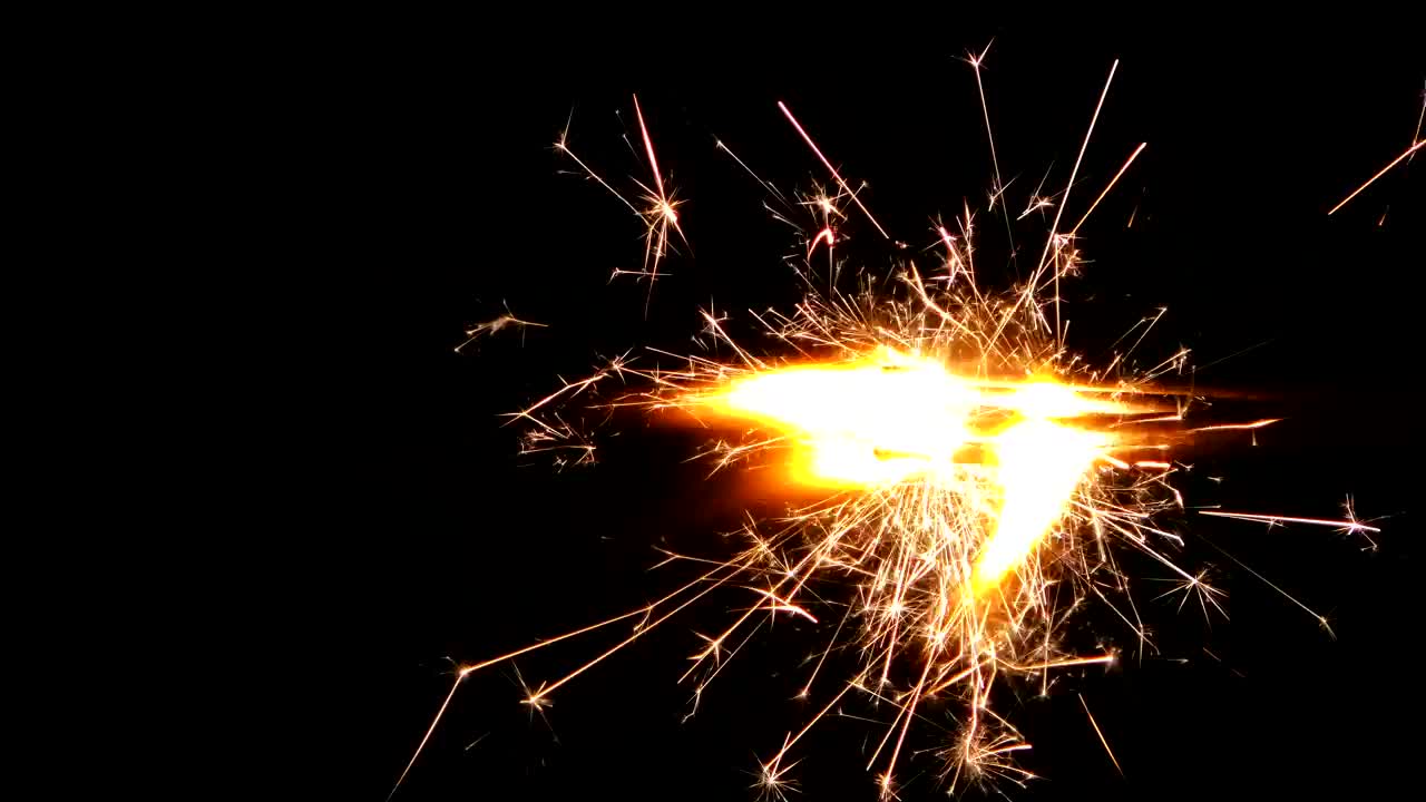 Free Video Stock Sparks Flame Lights Burning From The Right Of The Video Live Wallpaper