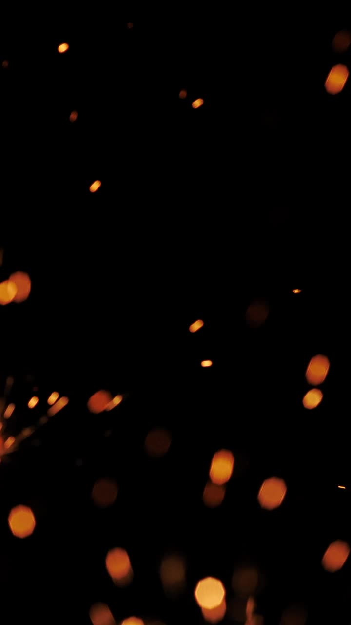 Free Video Stock Sparks Of Fire On A Black Background Live Wallpaper
