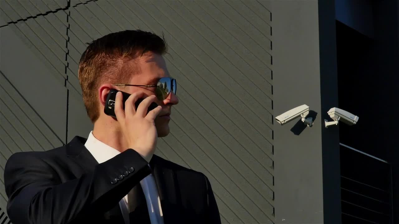 Free Video Stock Special Agent Talking On The Phone Live Wallpaper