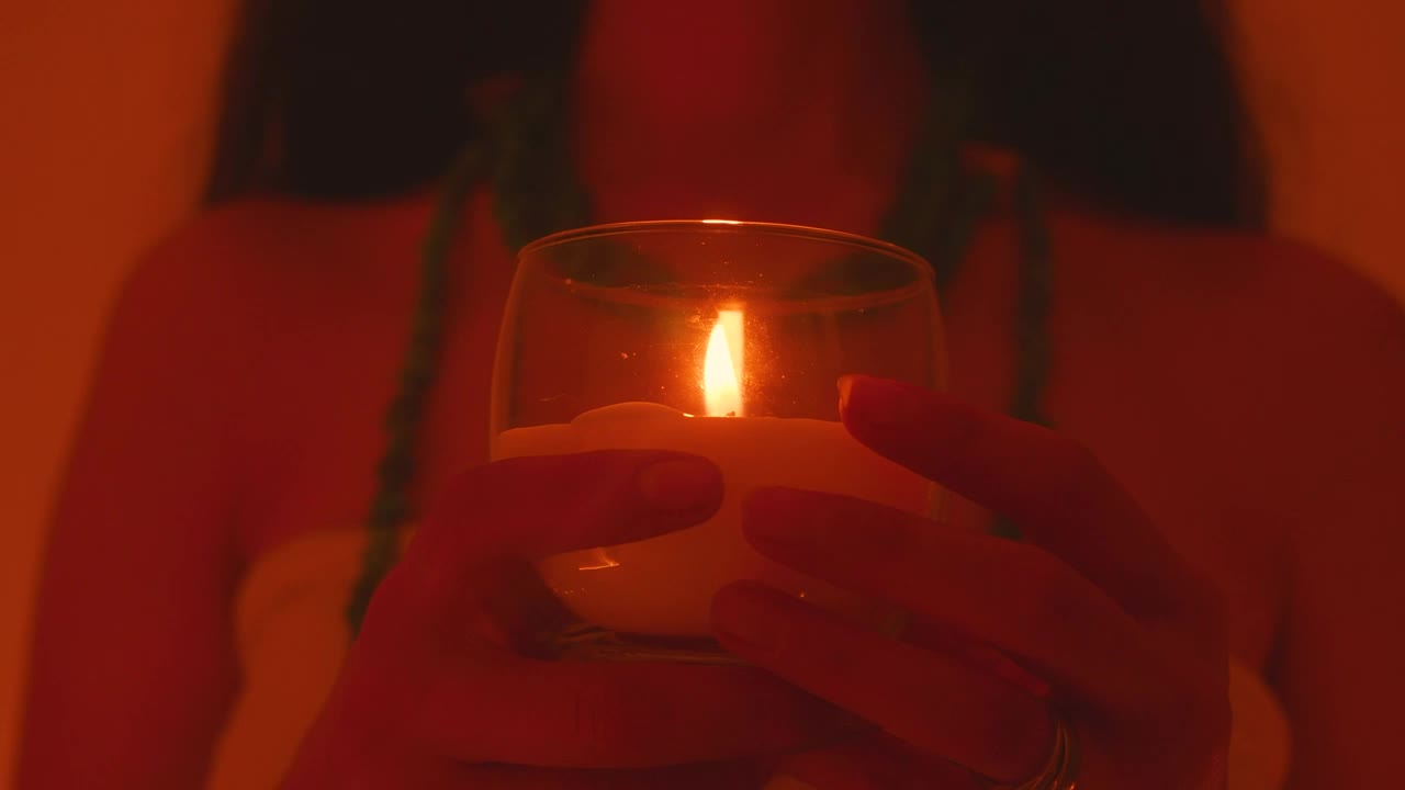 Free Video Stock Spiritual Girl Holding A Candle In Her Hands Live Wallpaper