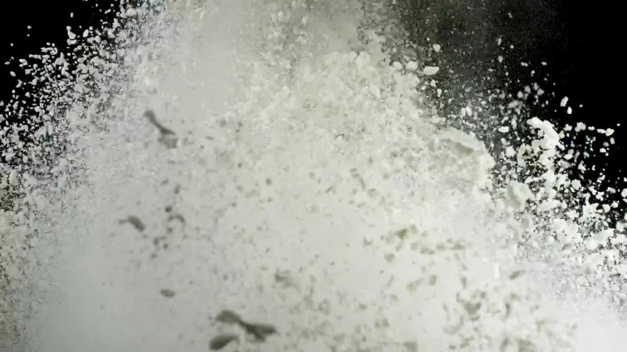 Free Video Stock Splash Of White Powder Against A Dark Screen Live Wallpaper
