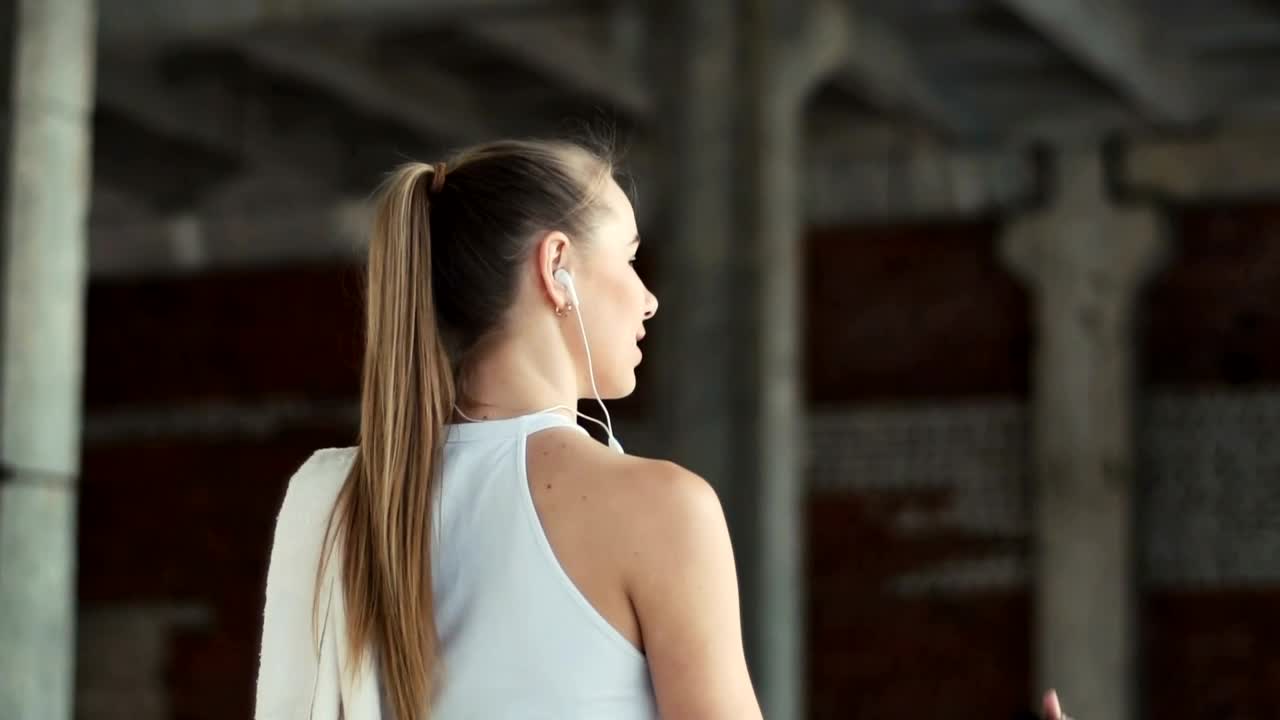 Free Video Stock Sport Woman Walking After Her Training Live Wallpaper
