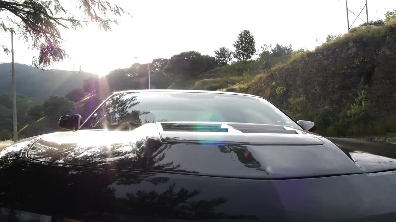 Free Video Stock Sports Car Parked Next To A Highway Live Wallpaper