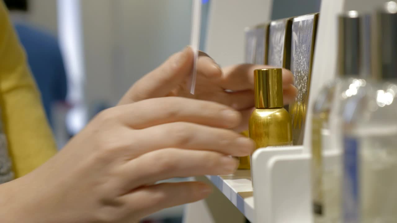 Free Video Stock Spraying A Perfume Sample In A Store Live Wallpaper