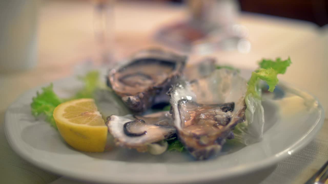 Free Video Stock Squeezing Lemon On Fresh Oysters Live Wallpaper