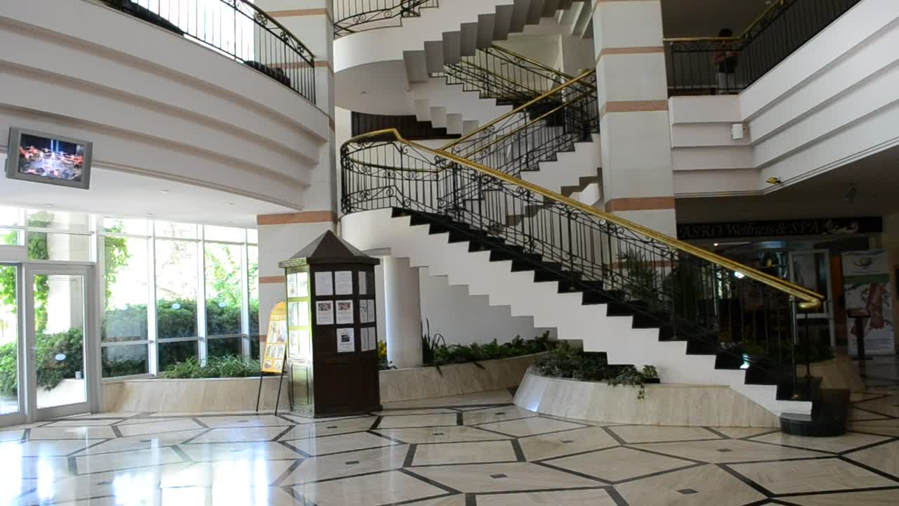 Free Video Stock Stairs Heading Up Through A Large Hotel  LargeLive Wallpaper