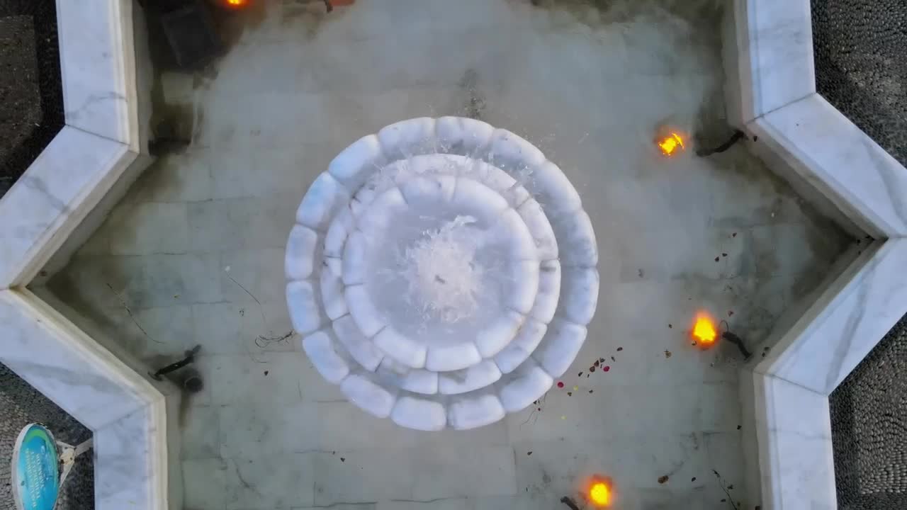 Free Video Stock Star Shaped Fountain In The Center Of A Garden Live Wallpaper