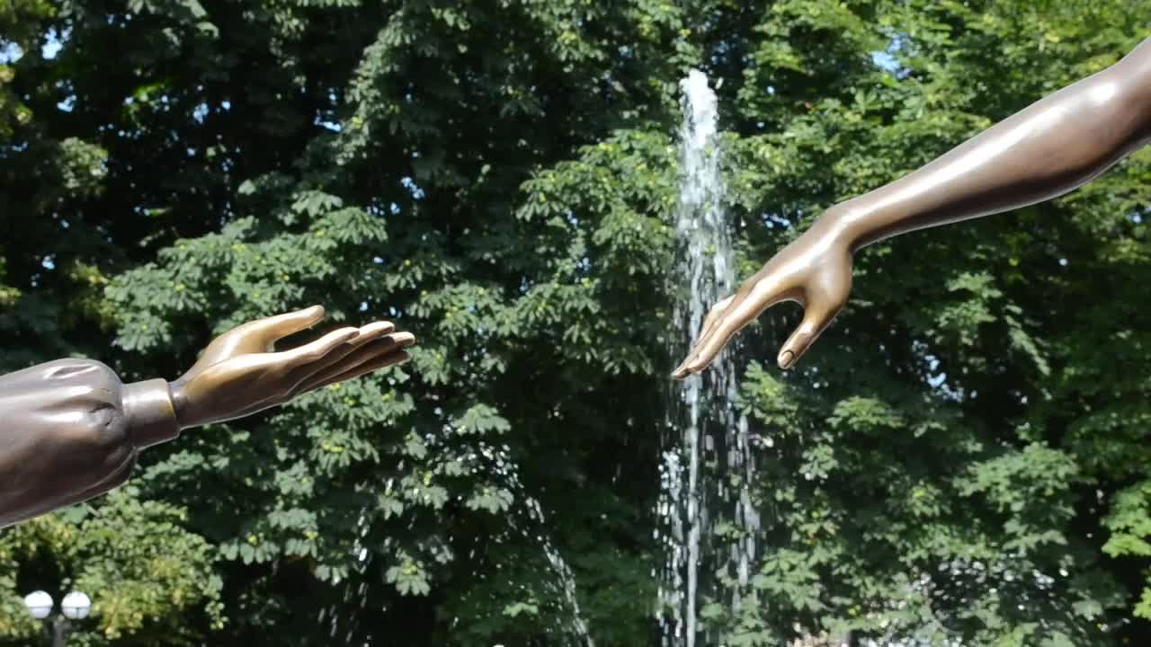Free Video Stock Statue Reaching Towards Another Live Wallpaper