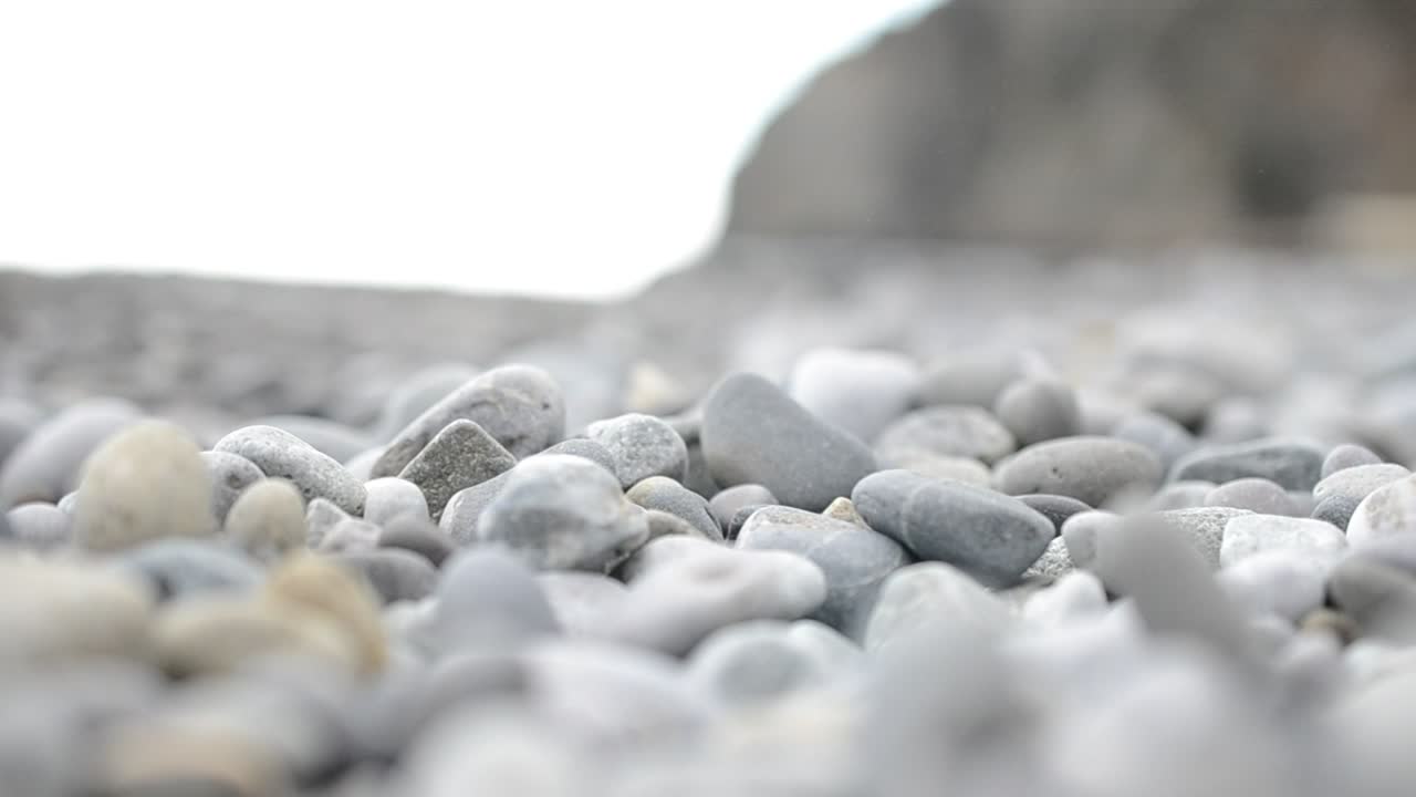 Free Video Stock Stones Covering A Beach Live Wallpaper