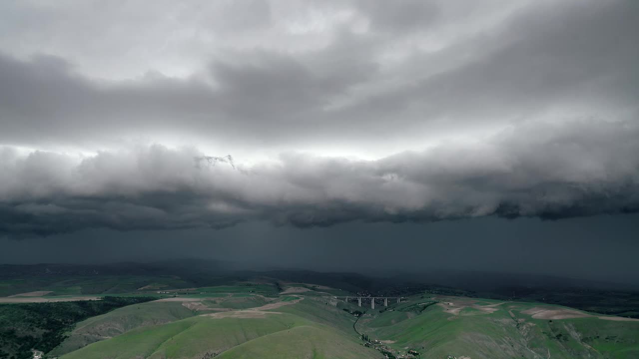 Free Video Stock Storm Clouds Over The Hills Live Wallpaper