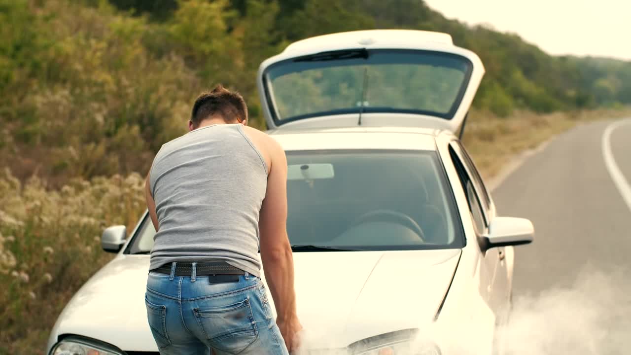 Free Video Stock Stranded On The Road With A Smoking Broken Car Live Wallpaper