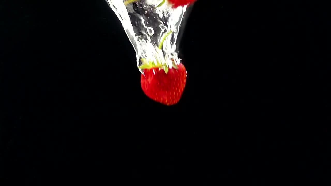 Free Video Stock Strawberries Falling Through Water Live Wallpaper