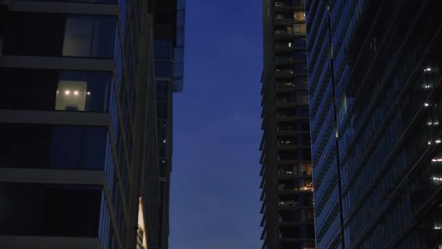 Free Video Stock Street Between Large Buildings At Sunset At Christmas Live Wallpaper