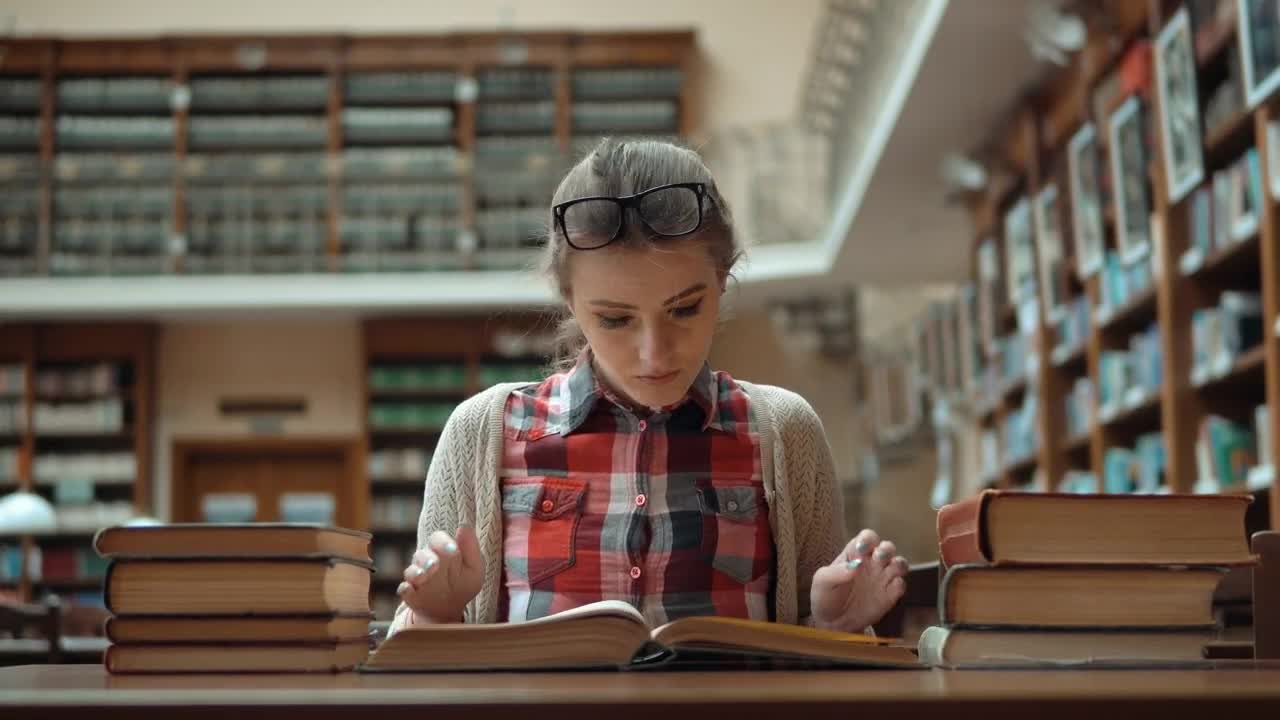 Free Video Stock Stressed Student Studies For Exam In Library Live Wallpaper