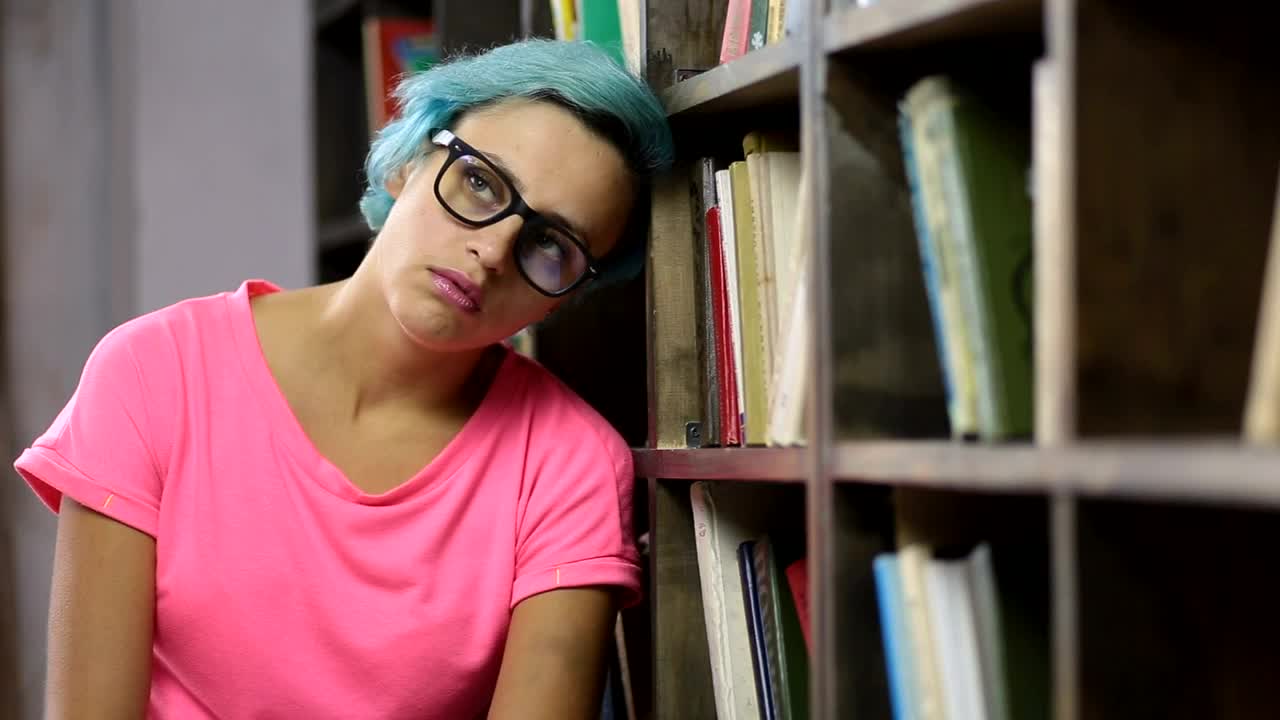 Free Video Stock Stressed Student In The Library Live Wallpaper