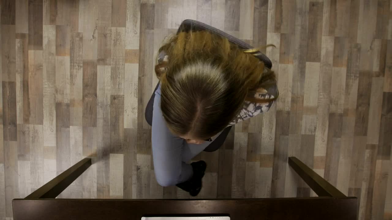 Free Video Stock Stressed Woman Spinning In Her Chair Live Wallpaper