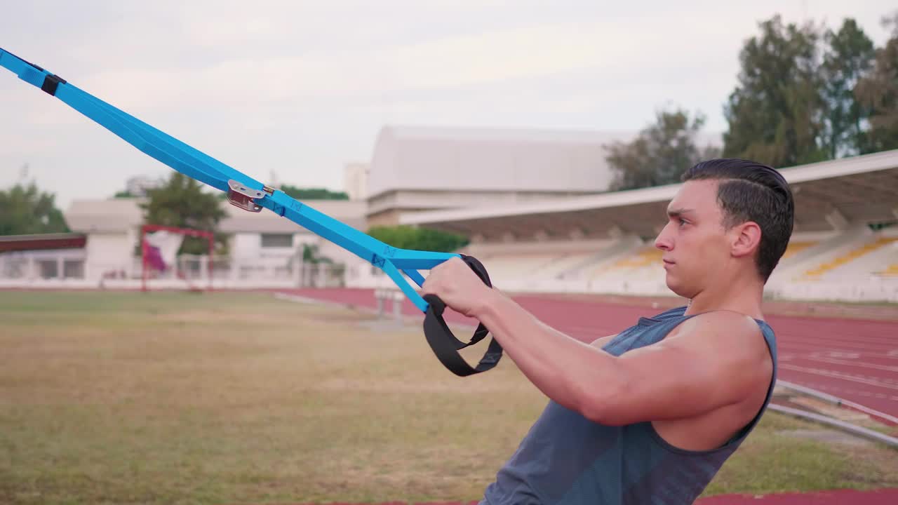 Free Video Stock Strong Man Exercising With Straps Live Wallpaper