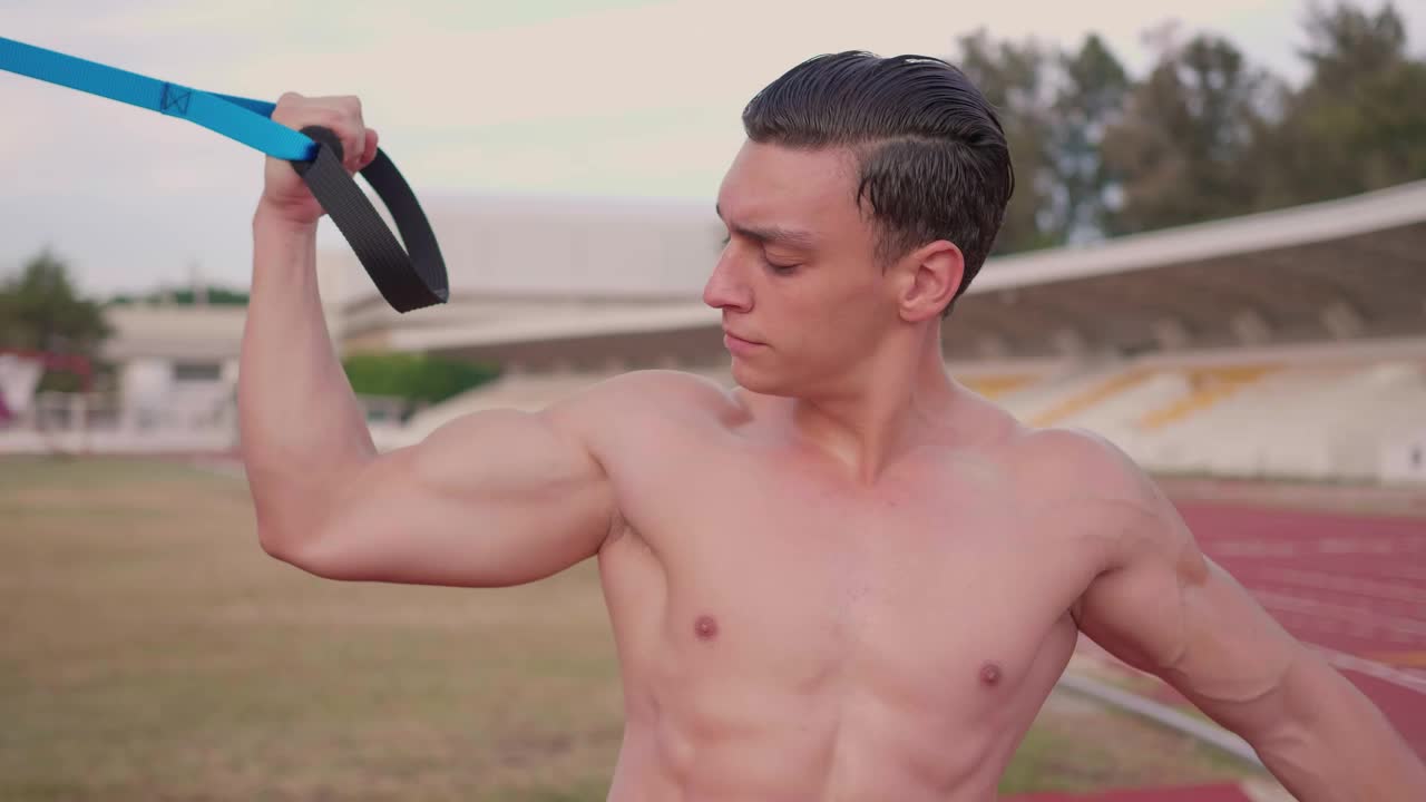 Free Video Stock Strong Man Working Out On A Sports Unit Live Wallpaper