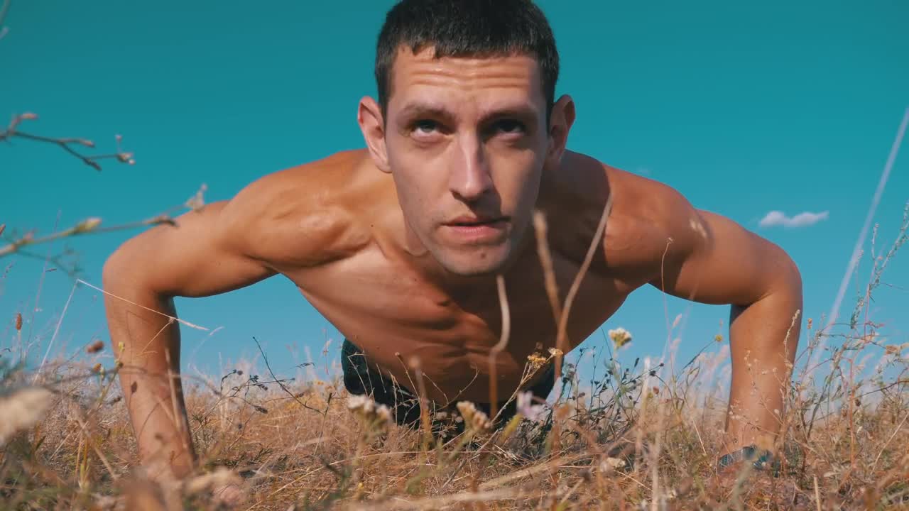 Free Video Stock Strongman Doing Push Outs Outdoors Live Wallpaper