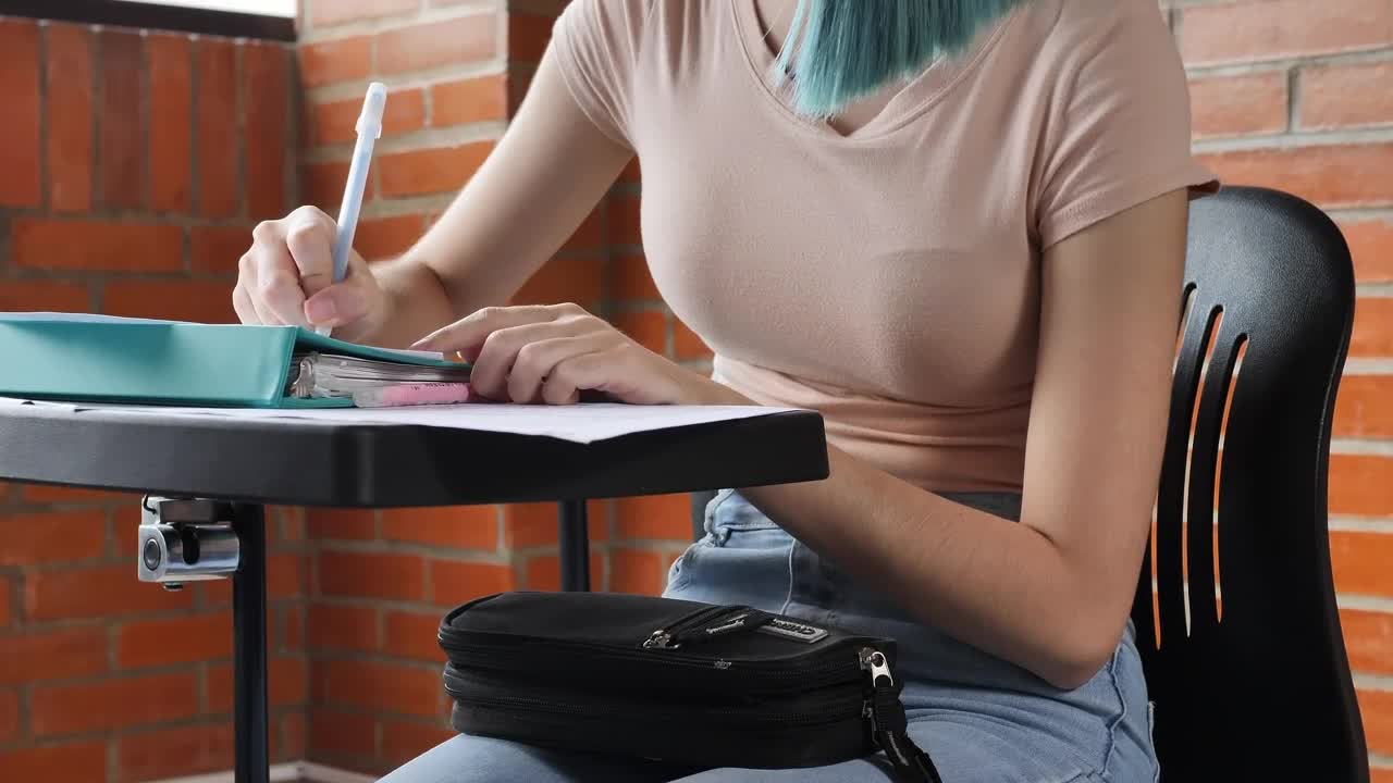 Free Video Stock Student Girl Sitting In An Armchair In Her Classroom Live Wallpaper