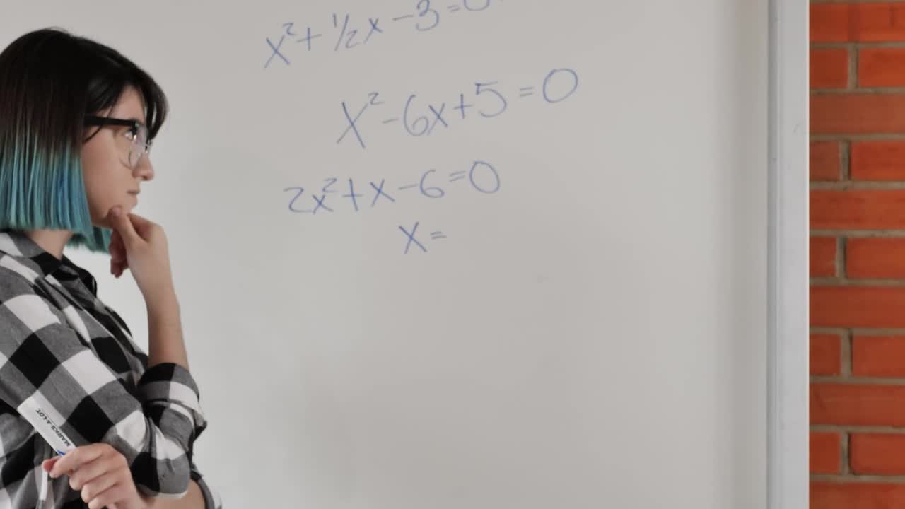Free Video Stock Student Girl Trying To Solve Equations On The Whiteboard Live Wallpaper