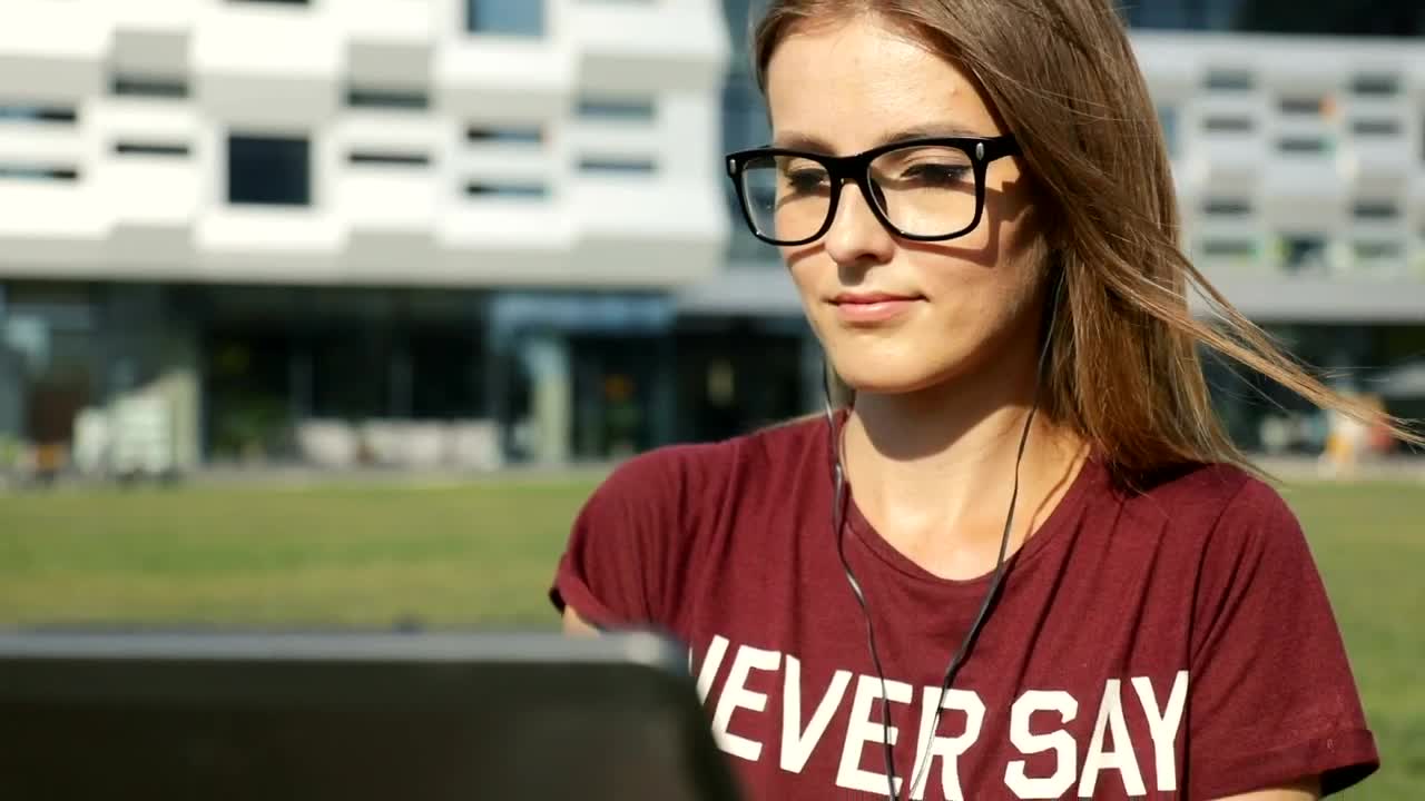 Free Video Stock Student Sitting Outside University With Laptop Live Wallpaper