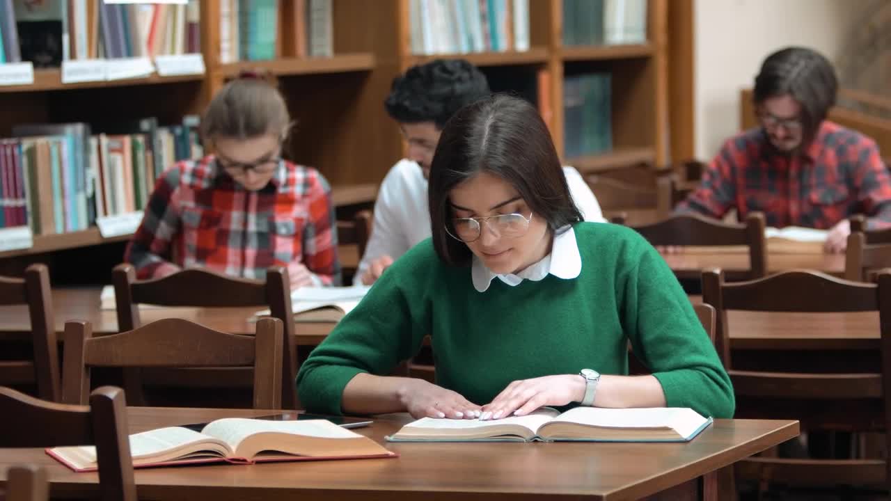Free Video Stock Students Do Academic Research In College Library Live Wallpaper