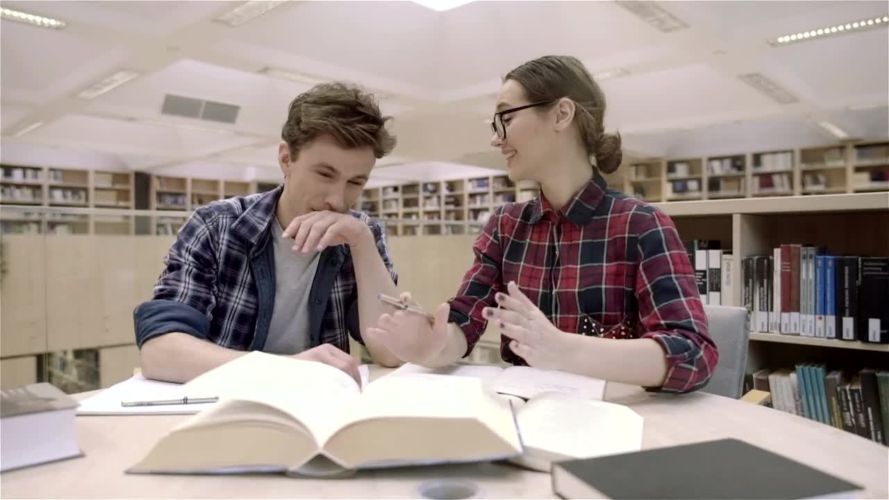 Free Video Stock Students Having Fun In The Library With The Books Live Wallpaper