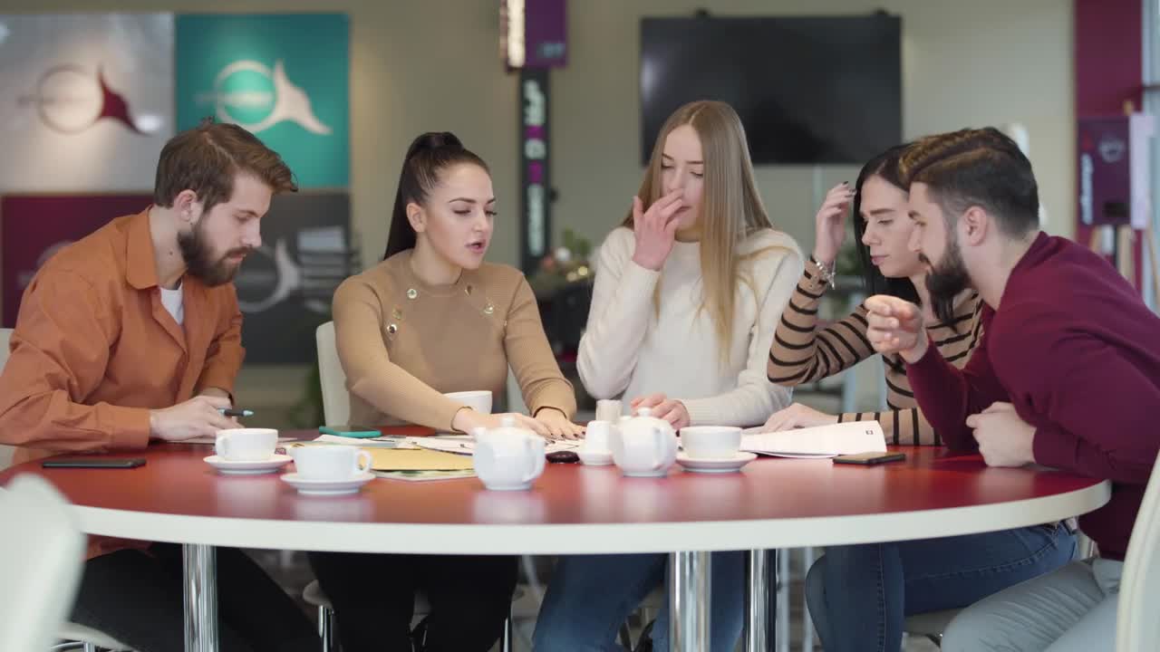 Free Video Stock Students In A Cafeteria Discussing An Assignment Live Wallpaper