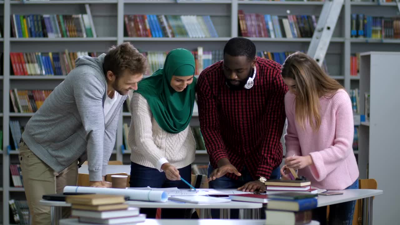Free Video Stock Students Standing In The Library Live Wallpaper