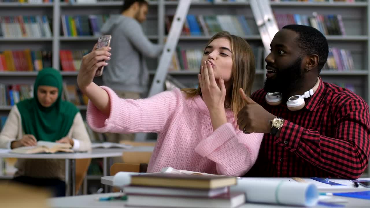 Free Video Stock Students Taking A Selfie In The Library Live Wallpaper