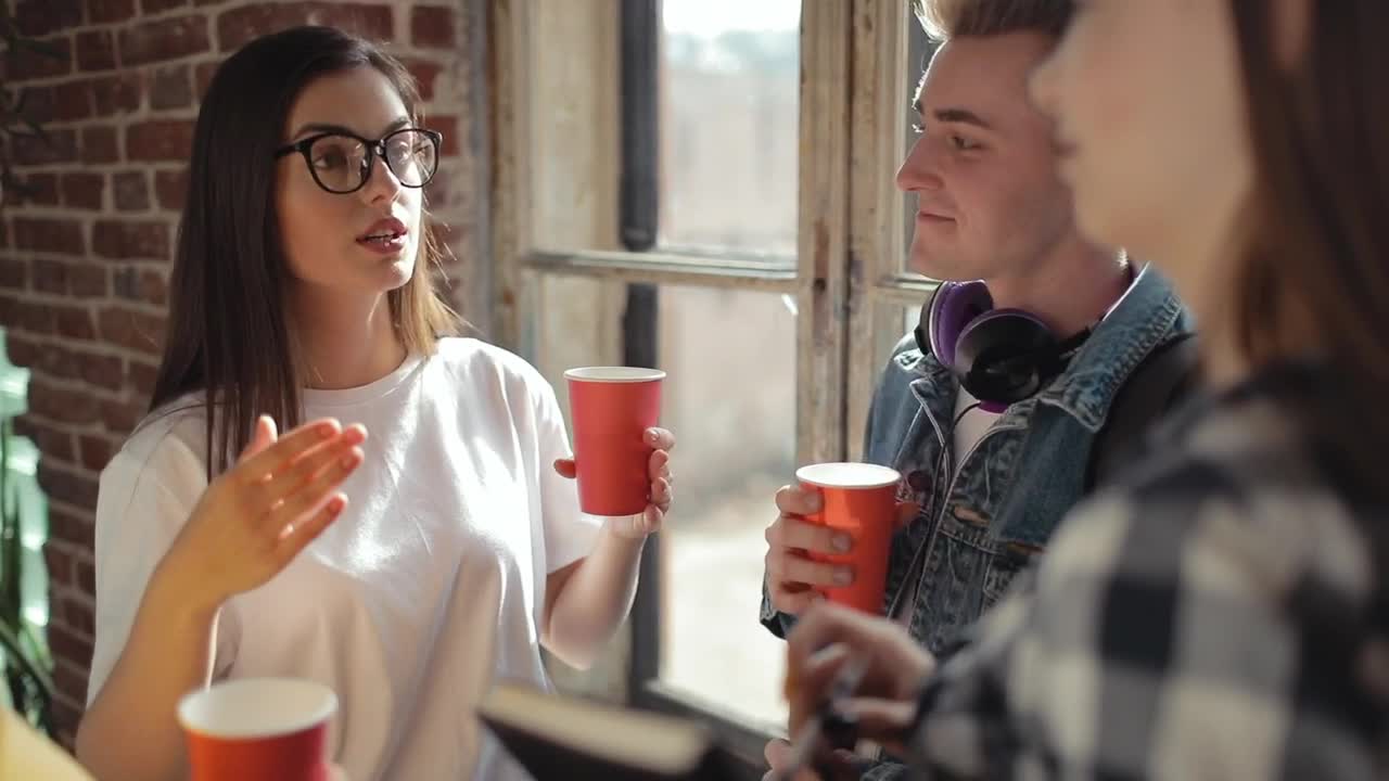 Free Video Stock Students Think And Talk About Ideas While Drinking Live Wallpaper