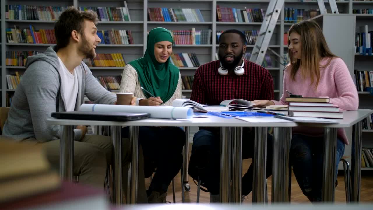 Free Video Stock Students Working In The Library Live Wallpaper