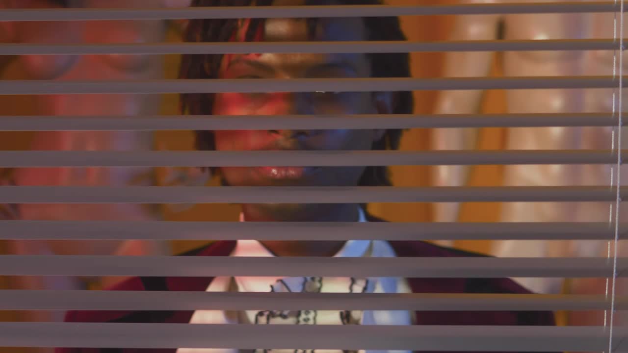 Free Video Stock Stylish Lgbtq Man Looking Through A Blind Live Wallpaper