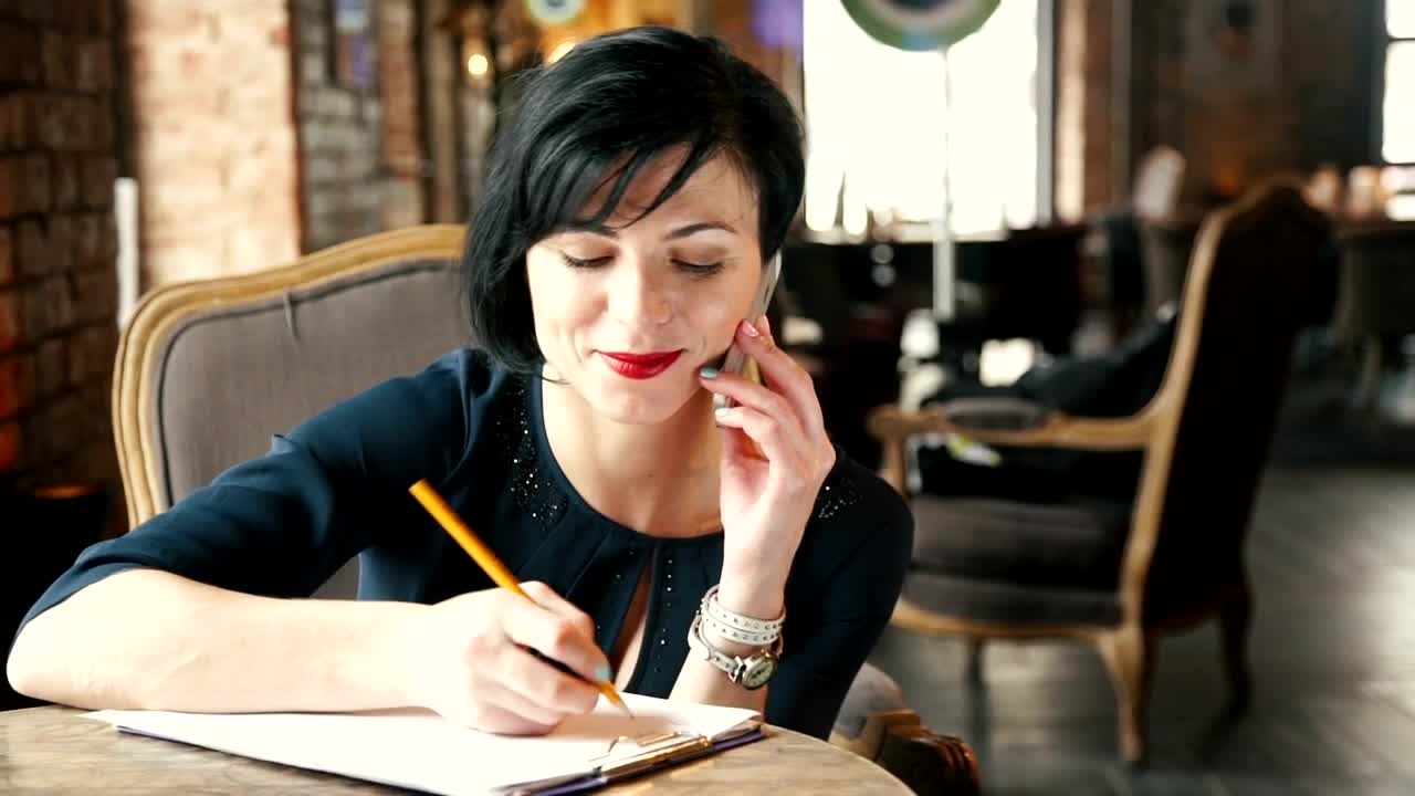 Free Video Stock Stylish Woman Talks On Mobile Phone In Vintage Cafe Live Wallpaper